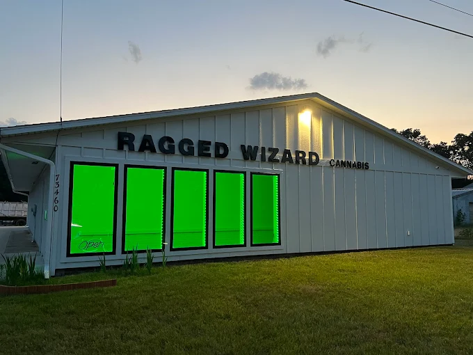Ragged Wizard storefront with iconic glowing green windows in Lawton, Michigan