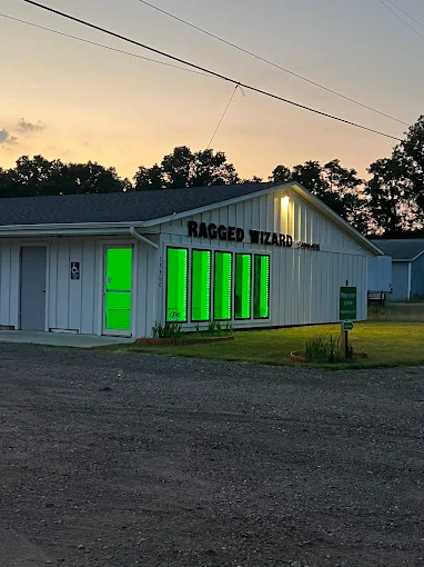 Ragged Wizard storefront, dusk view